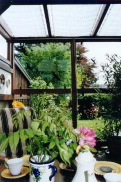 Innenbeschattung Terrassenüberdachung mit Sonnensegeln