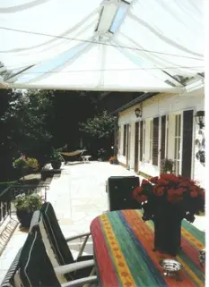 Glasdach Sonnenschutz mit Faltsonnensegel als Innenbeschattung